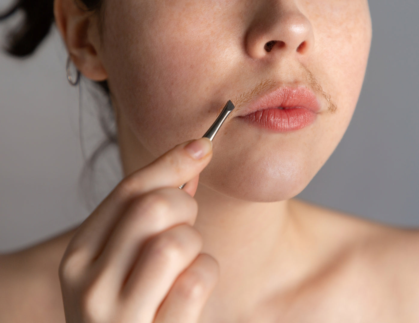 Women’s Facial Hair: Causes, Treatments, & Solutions