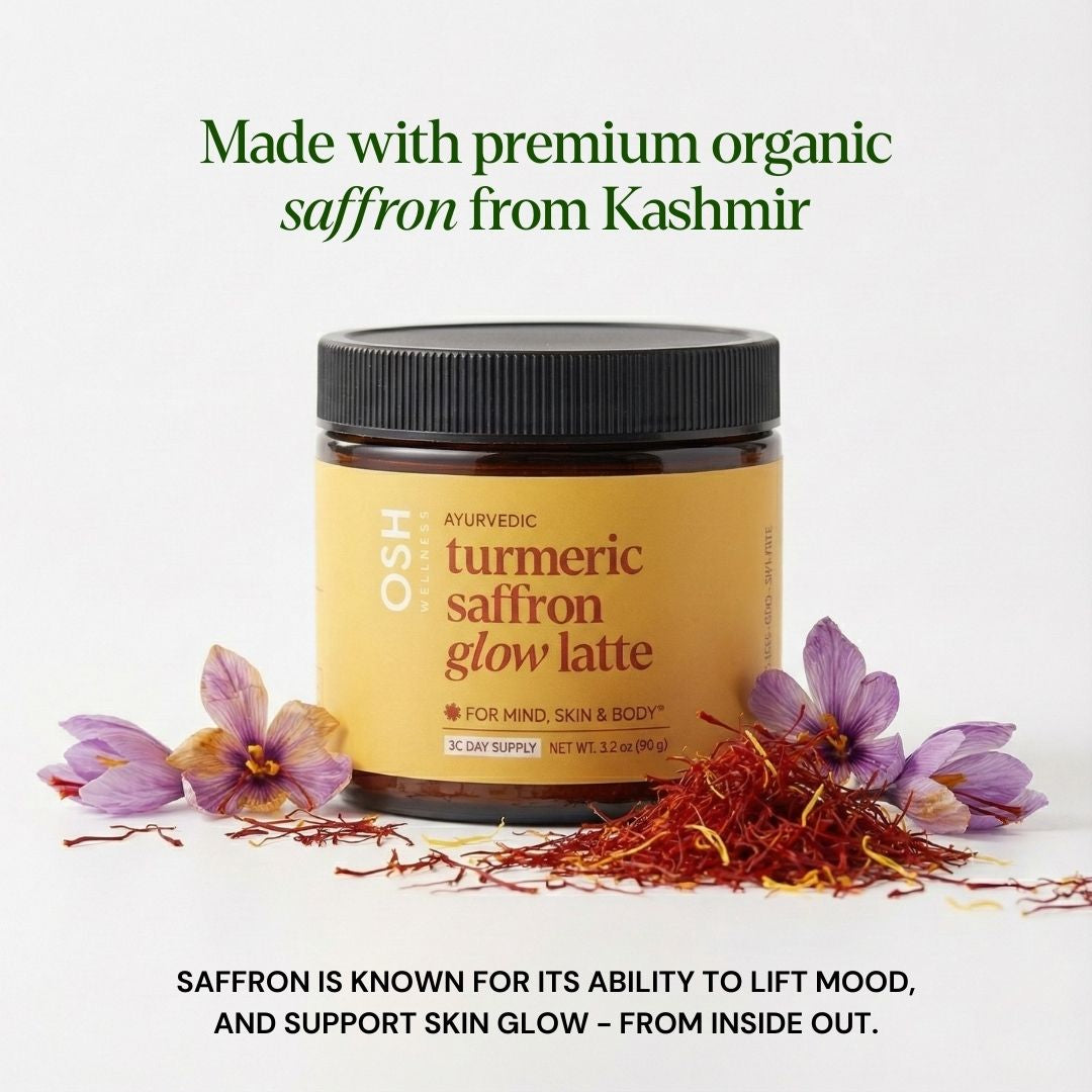 Jar of OSH Ayurvedic turmeric saffron glow latte with saffron strands and flowers on a white background
